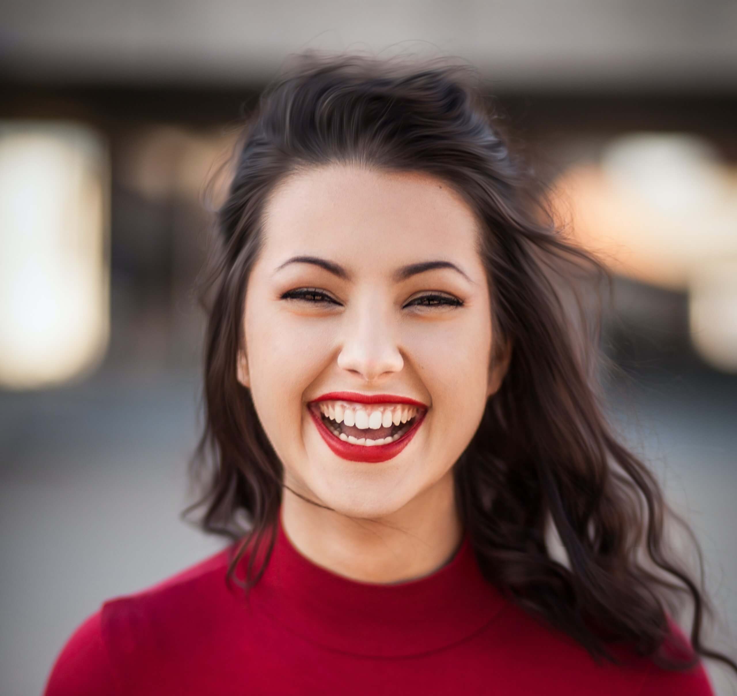 Image of a young woman happy with her new smile